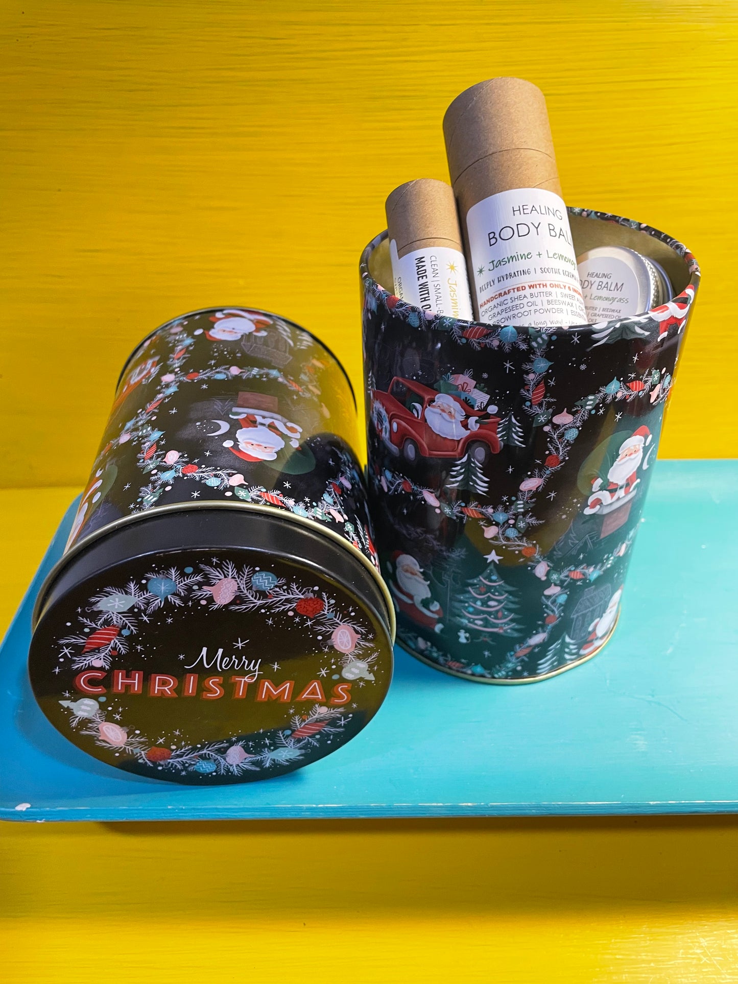 JASMINE + LEMONGRASS 3-Pack Gift Set | 2 Jasmine + Lemongrass Body Balms (2 oz Cardboard Tube + Mini Tin) + Compostable Lip Balm | Festive Cylindrical Santa + Chimney TIN | Christmas Gift | Gift Sets