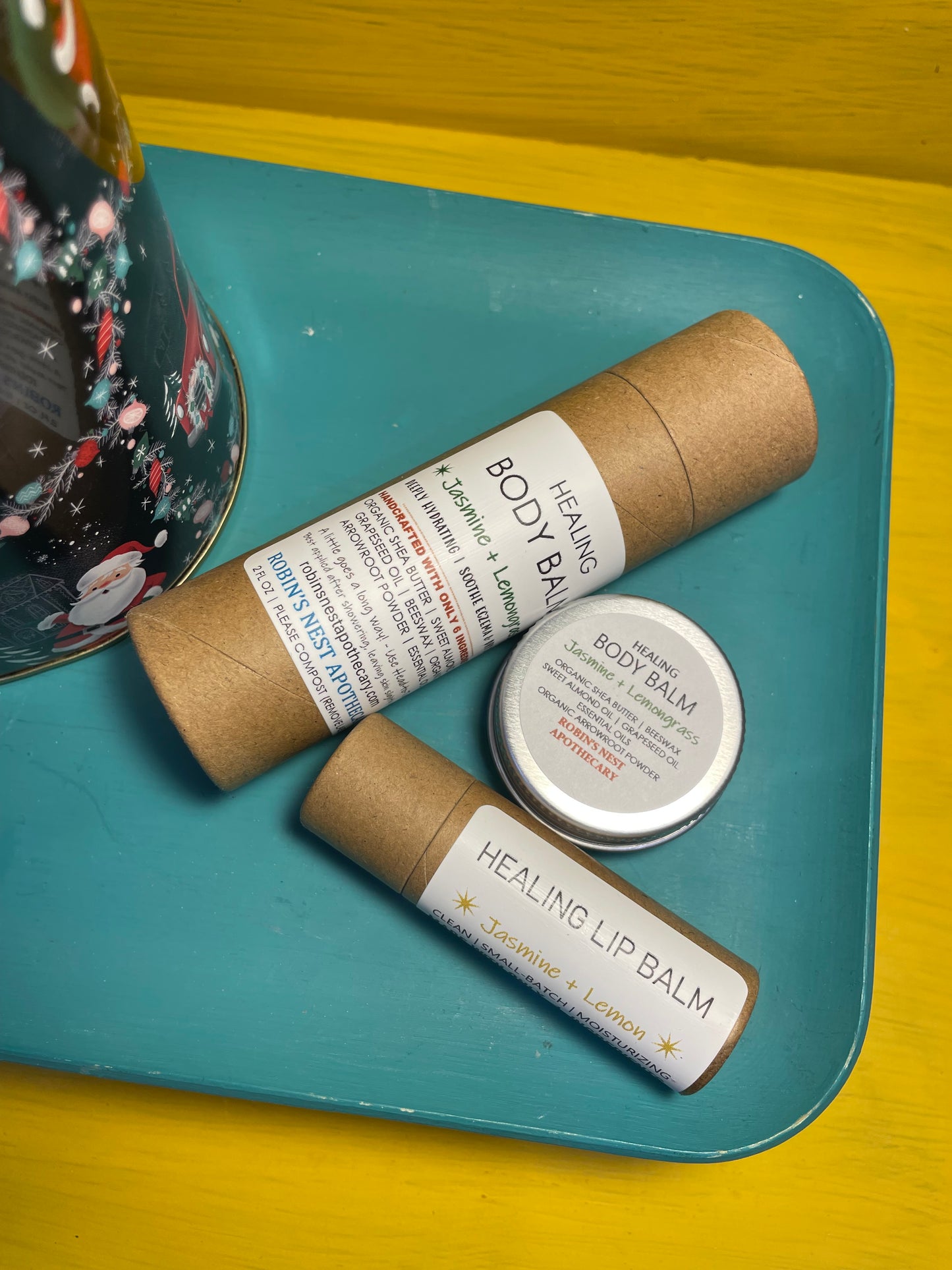 JASMINE + LEMONGRASS 3-Pack Gift Set | 2 Jasmine + Lemongrass Body Balms (2 oz Cardboard Tube + Mini Tin) + Compostable Lip Balm | Festive Cylindrical Santa + Chimney TIN | Christmas Gift | Gift Sets