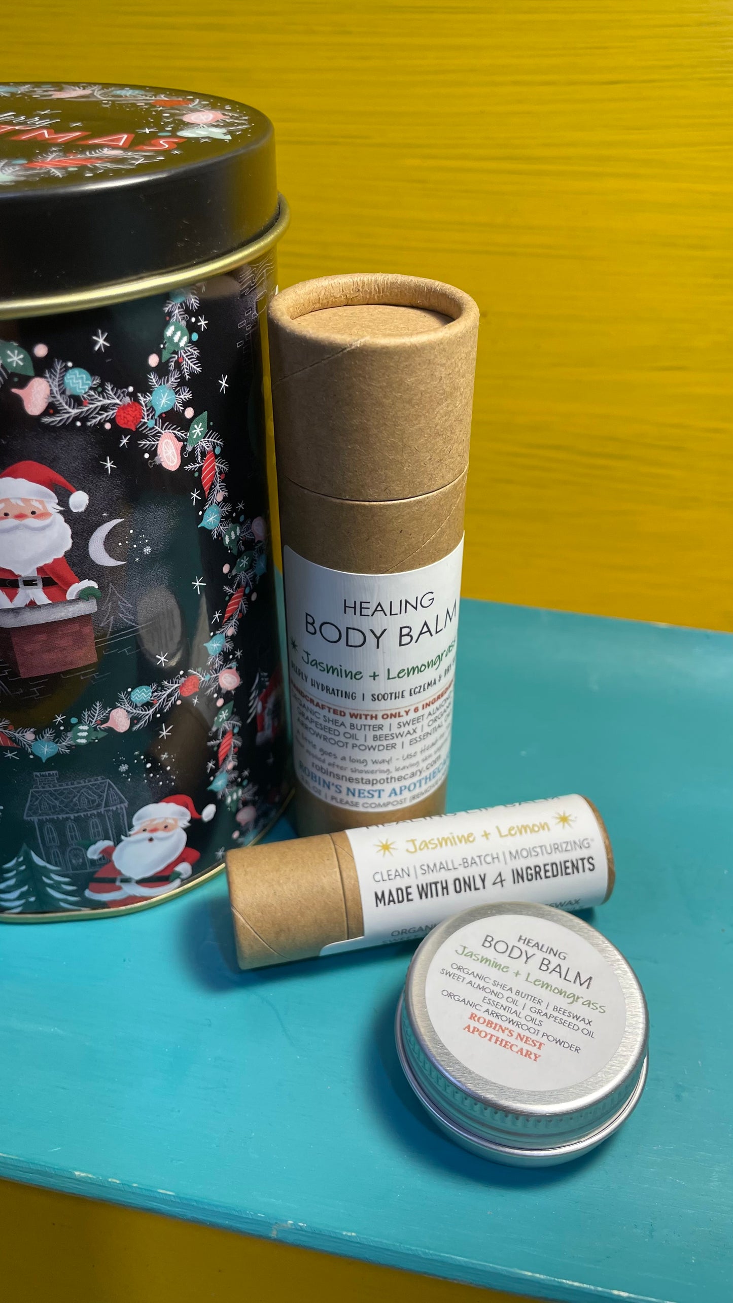 JASMINE + LEMONGRASS 3-Pack Gift Set | 2 Jasmine + Lemongrass Body Balms (2 oz Cardboard Tube + Mini Tin) + Compostable Lip Balm | Festive Cylindrical Santa + Chimney TIN | Christmas Gift | Gift Sets